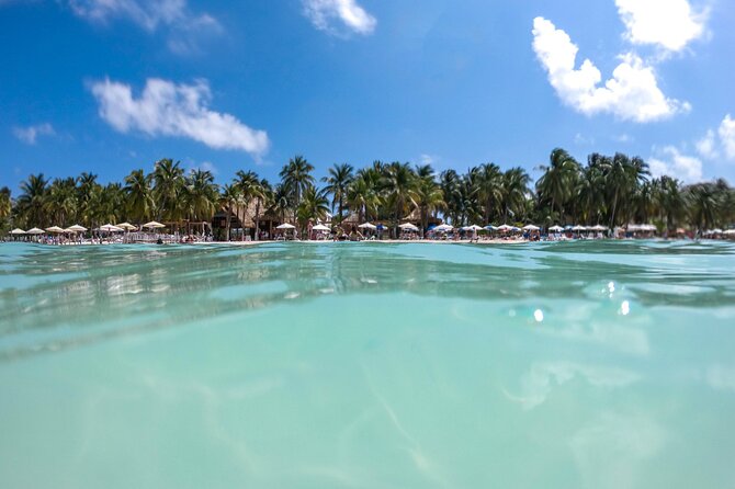 Sailing away-Island Adventour Yacht - Isla Mujeres Beach Club - Sailing Across the Caribbean on a Shared Yacht