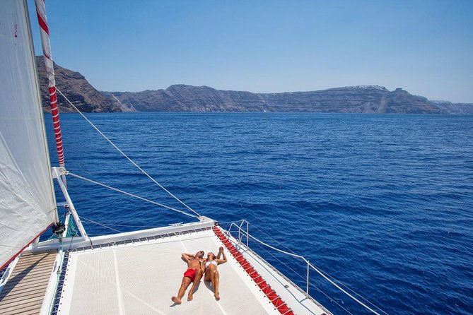 Sailing Catamaran Cruise in Santorini with BBQ, Drinks and Transfer - The Hot Springs and the Volcano from the Sea
