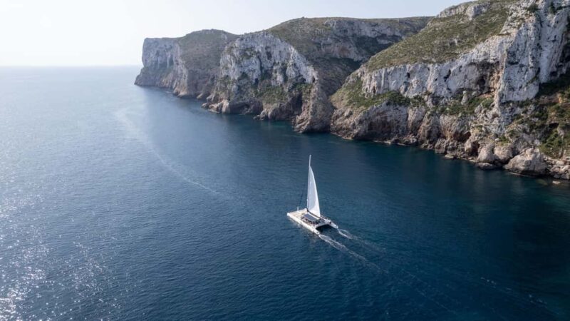 Sailing catamaran ride through Cova Tallada and optional swim stop - Seating Options and Relaxation on the Boat