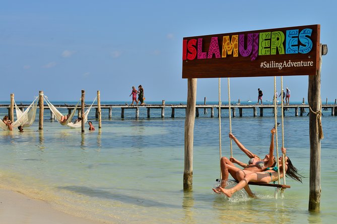Sailing Catamaran with Open Bar to Isla Mujeres - All-Inclusive Drinks and Party Atmosphere Onboard