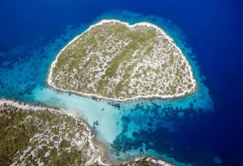 Samos East Coast by Boat with Beachside BBQ - Passing Kasonisi Island for Stunning Coastal Views