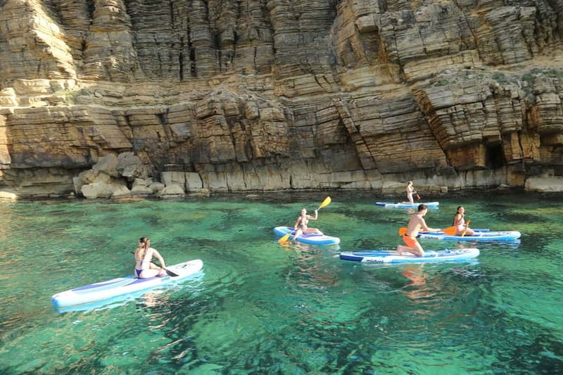 San Antonio: Cala Salada & Cala Gracio Sunset Boat Trip - Water Activities: Snorkeling, Paddleboarding, and Swimming
