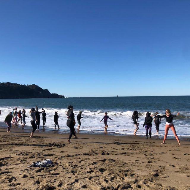 San Francisco: Silent Disco Yoga at Baker Beach - Using Silent Disco Headphones and Yoga Towels