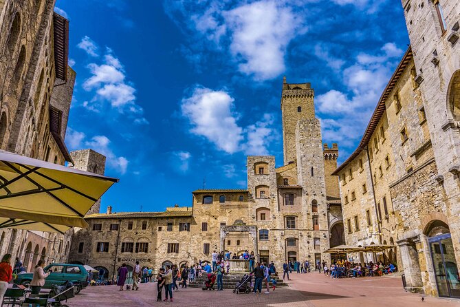San Gimignano Walking Tour with Audioguide on Your Smartphone - Wandering Via San Matteo and the Rocca of Montestaffoli