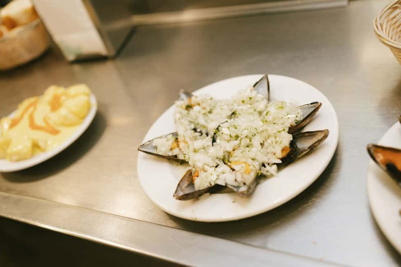 San Sebastian: Pintxos and Wine Tour - Grilled Steak and Navarra Wine Pairing