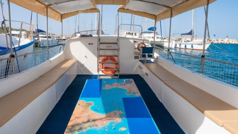 San Vito Lo Capo: Boat Trip with 3 Swimming Stops and Snacks - Food, Drink, and Onboard Atmosphere