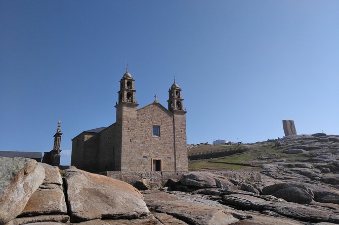 Santiago de Compostela: Finisterre, Muxía & Costa da Morte - Exploring Fisterra: A Fishing Village and Culinary Hub