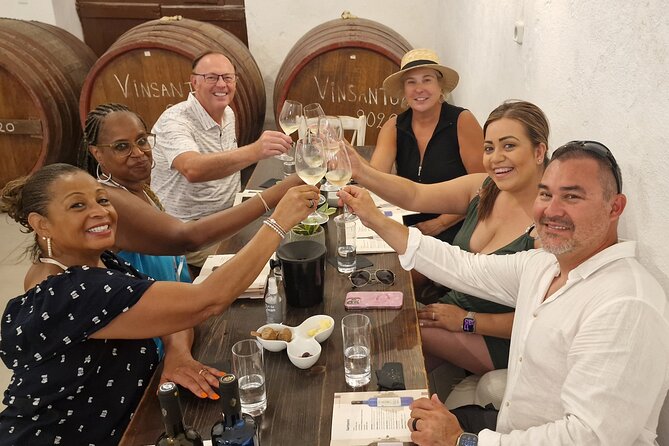 Santorini: 4hrs Small Group Wine Tasting and History Tour - Savoring Award-Winning Wines at Estate Argyros