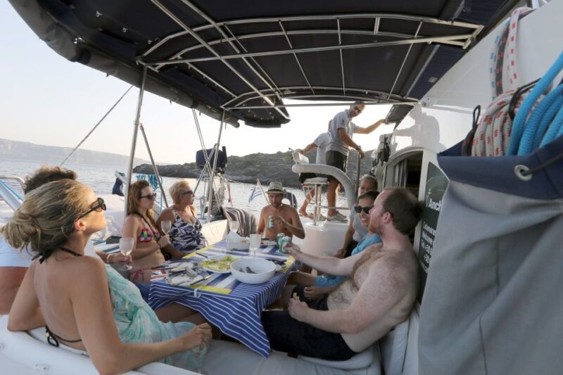 Santorini: 7-Hour Private Catamaran Cruise with Food & Drink - Visiting Thirassia and Oia: Scenic Photo Stops and Relaxation