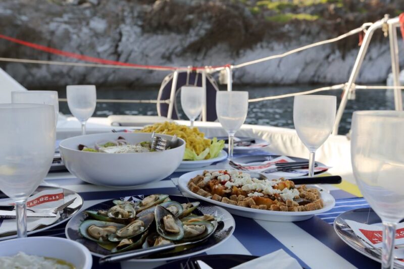 Santorini: 7-Hour Private Catamaran Cruise with Food & Drink - Gourmet Meal and Free Drinks Onboard