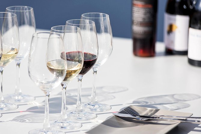 Santorini Archaeology and Wine Small-Group Tour with Tastings - Visiting the Akrotiri Archaeological Site