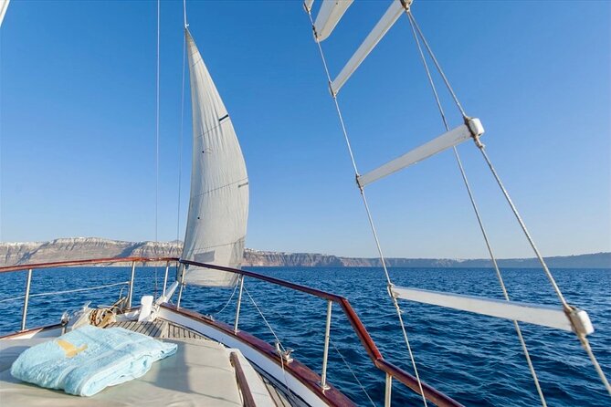 Santorini Caldera Day Traditional Cruise with Meal and Drinks - Black Mountain and Indian Rock: Scenic Passages
