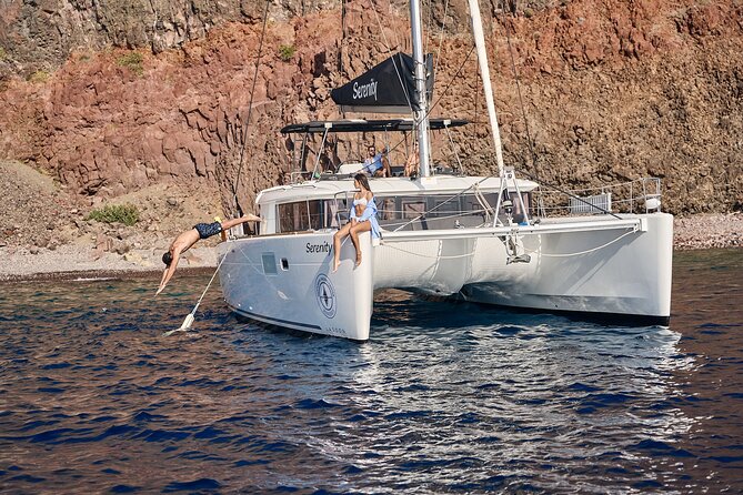 Santorini: Caldera Luxury Catamaran Cruise with Meal & Drinks - Modern Comfort and Friendly Service on a Well-Equipped Catamaran