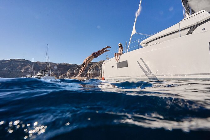 Santorini: Caldera Private Catamaran Cruise with Meal & Drinks - Gourmet Lunch with Local Flavors on Board
