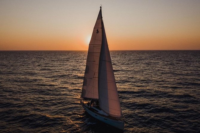 Santorini Caldera Private Sailing Boat Cruise - Exploring Mesa Pigadia Beach and the Black Mountain