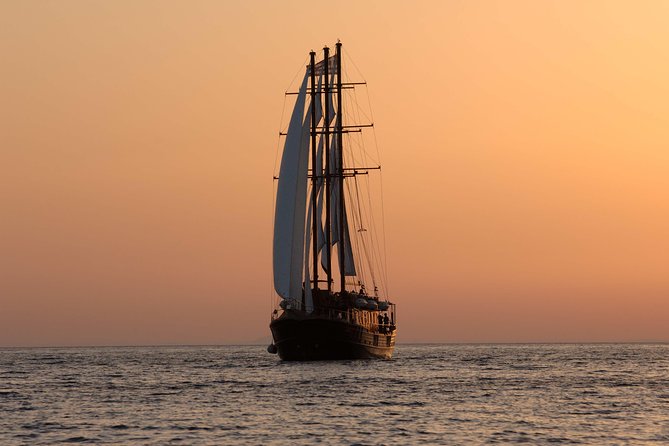 Santorini Caldera Sunset Sailing Cruise with Dinner and Wine - Swimming in Palea Kameni Hot Springs