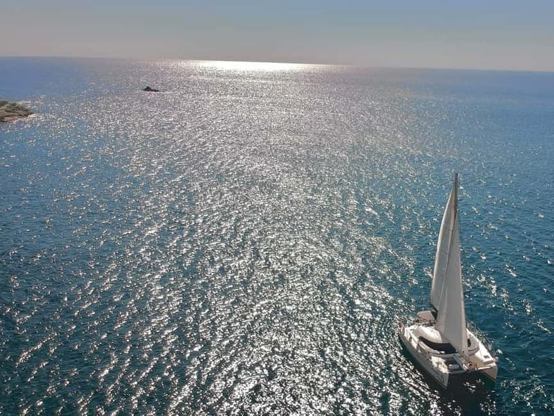 Santorini: Catamaran Cruise with Food and Drinks - The Sunset and Additional Sailing Time