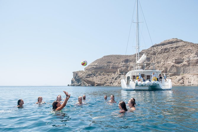 Santorini Catamaran Cruise with Fresh Meal and Open Bar - Bathing in the Volcanic Hot Springs at Palea Kameni