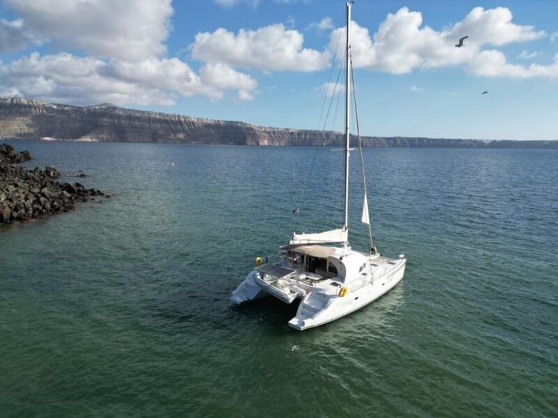 Santorini: Catamaran Cruise with Greek BBQ and Drinks - Explore Iconic Beaches: Red and White Beaches