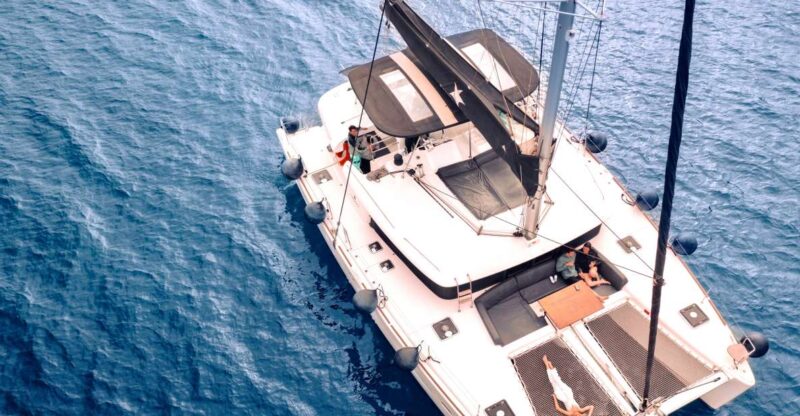 Santorini: Catamaran Cruise with Lunch, Drinks, & Oia Visit - Exploring Santorini from the Water: An Overview of the Catamaran Tour