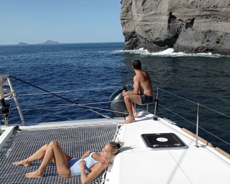 Santorini: Catamaran Cruise with Lunch, Drinks, & Oia Visit - Sunset at Vlichada Port