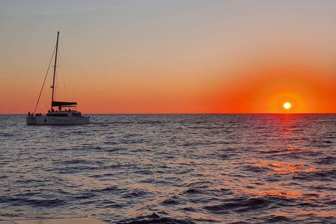 Santorini Classic Catamaran Cruise with BBQ, Drinks and Transfers - Santorinis Coastline and Volcano from the Water