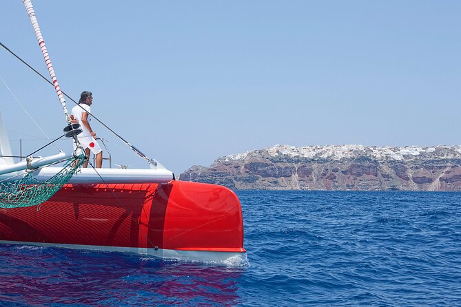 Santorini Cruise on Catamaran with BBQ & Open Bar - Onboard Amenities and Practical Details