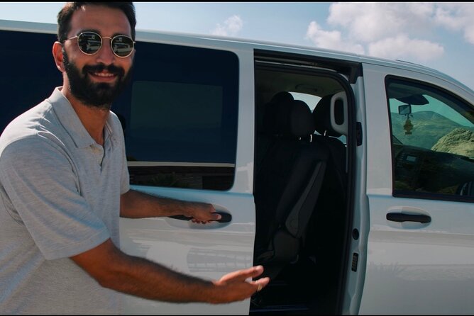 Santorini Elegance:Premium Transfer Services for Airport and Port - The Experience of Meliton Tours Guide