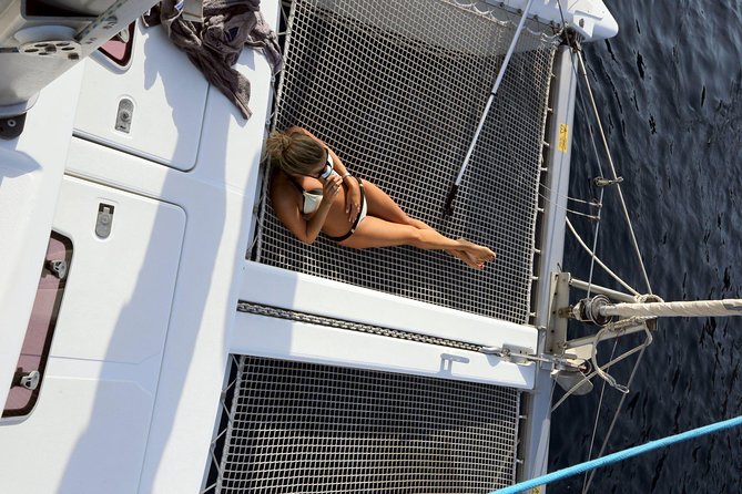 Santorini Full Day Catamaran Private Cruise incl. Meal, Drinks & Free Transport - Santorini’s South Coast: Starting at Vlihada Port