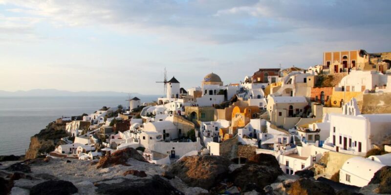 Santorini: Full-Day Small Group Tour - Relaxing at Perivolos Black Sand Beach