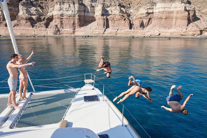 Santorini Gold Catamaran Cruise with BBQ, Drinks and Hotel Pickup - Lunch or Dinner at Mesa Pigadia Beach