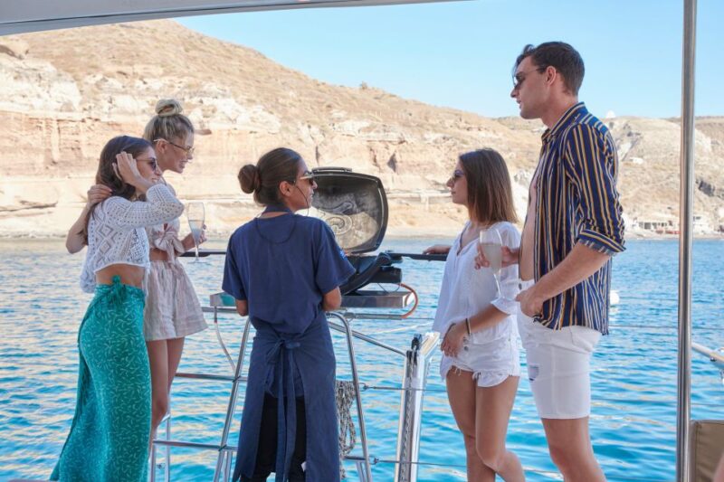 Santorini Gold Catamaran Cruise with Snorkel, BBQ & Open Bar - Final Stop at Mesa Pigadia for More Swimming