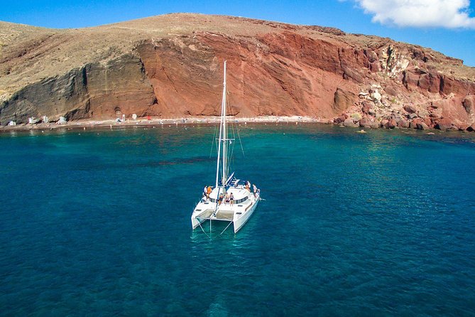 Santorini Half Day Catamaran Private Cruise incl. Meal, Drinks & Free Transport - Exploring Santorini’s Iconic Beaches from the Water