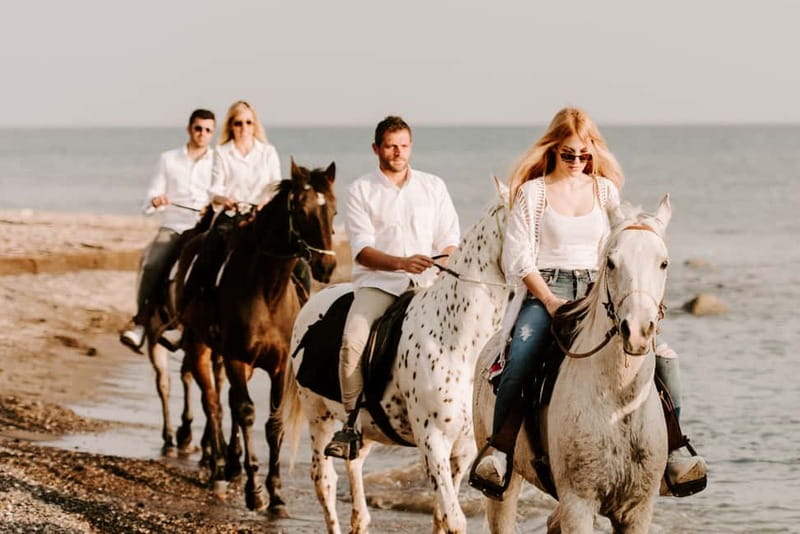 Santorini: Horseback Riding on the Black Sandy Eros Beach - Approaching Eros Beach: Black Sand and Tranquil Waters