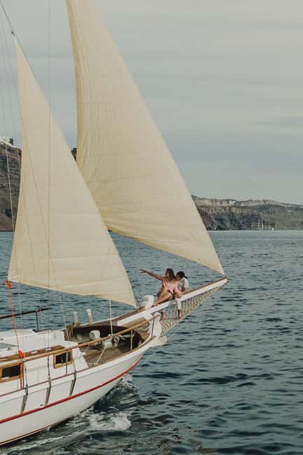 Santorini: Ios Island Overnight Sailing Trip with Meals - Key Points