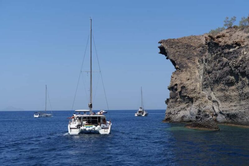 Santorini: Luxury Caldera Cruise With Meal & Drinks - Snorkeling in the Blue Aegean Sea