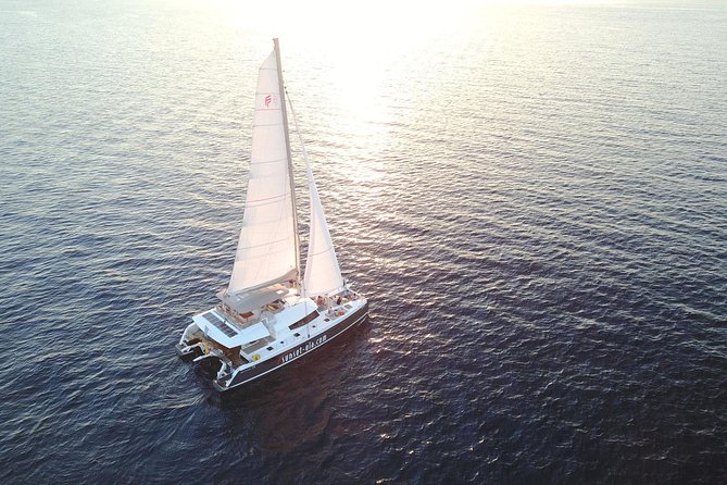 Santorini Luxury Catamaran Day Cruise with BBQ,drinks,transfer - Key Points