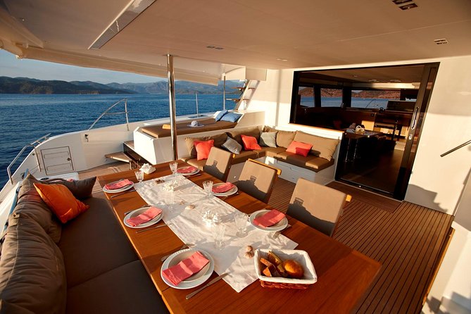 Santorini Luxury Catamaran Day Cruise with BBQ,drinks,transfer - Weather Policy and Flexibility