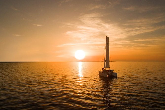 Santorini Luxury Catamaran Sunset Cruise with BBQ, Drink and Transfer - Onboard Greek BBQ and Refreshments