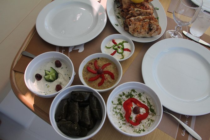 Santorini Luxury Sailing Catamaran Cruise with BBQ, Drinks and Transfer - Navigating Santorini’s Iconic Coastline