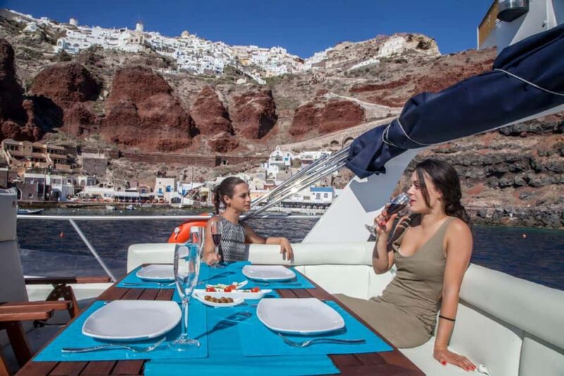 Santorini: Motor Yacht Sunset Cruise with 5-Course Dinner - Indulge in a 5-Course Dinner with Unlimited Drinks