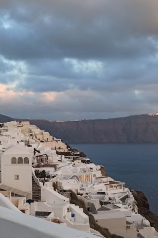 Santorini: Oia Cultural Highlights Sunset Walking Tour - Discovering Oia’s Blue Domes in Peaceful Sunset Light