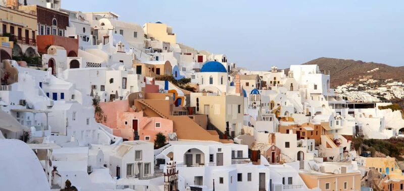 Santorini: Oia Walking Tour and Lighthouse Sunset with Wine - Exploring Pyrgos and Megalochori’s Traditional Village Life
