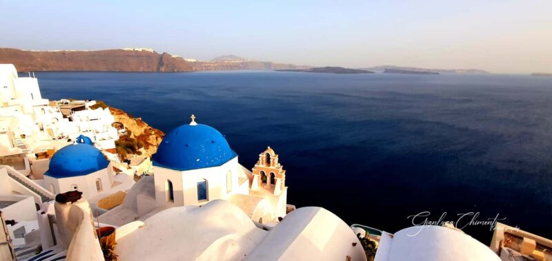 Santorini: Oia Walking Tour and Lighthouse Sunset with Wine - Logistics, Transport, and Group Experience