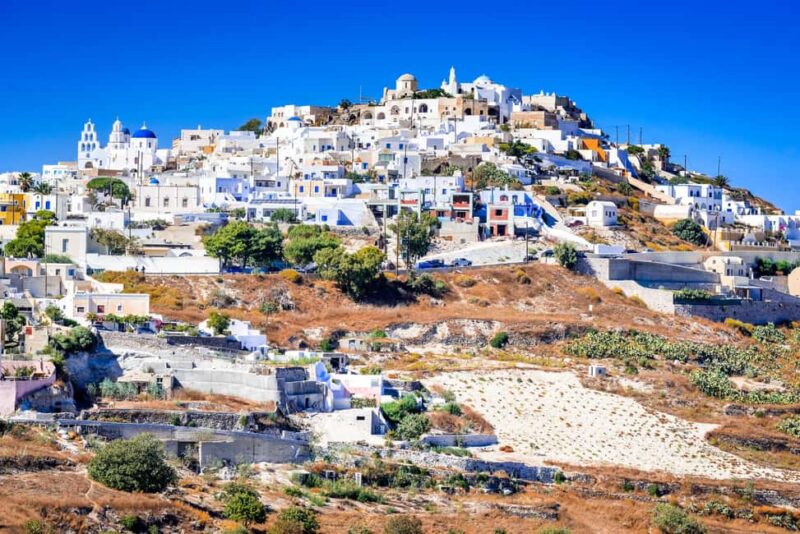 Santorini: Oia Walking Tour and Lighthouse Sunset with Wine - Physical Requirements and Tips for Participants