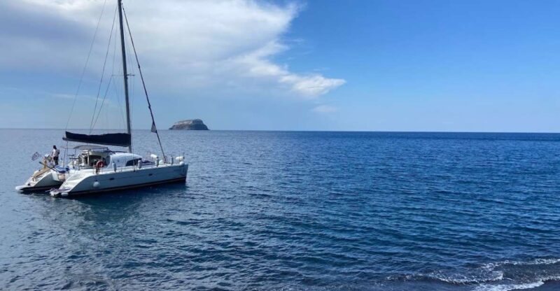 Santorini: Private All-In Catamaran Cruise, with Food|Drinks - Relaxing and Taking in the Views on the Return Journey