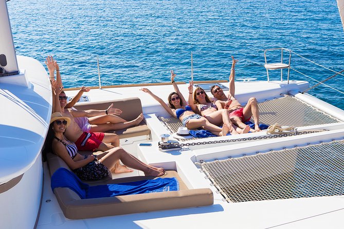 Santorini Private Catamaran Cruise with BBQ, Open Bar & Transfers - Exploring Palea Kameni and Nea Kameni Volcano Islands