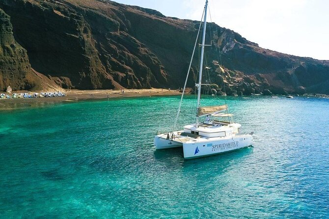 Santorini Private Catamaran Cruise with BBQ, Open Bar & Transfers - Sunset or Daytime Cruises: Choosing Your Perfect Moment