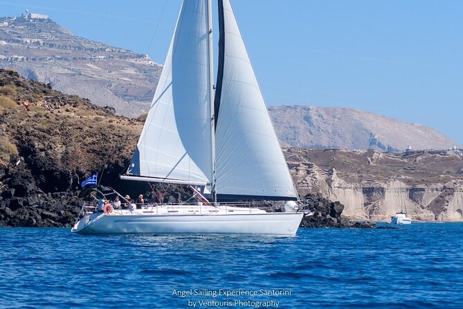 Santorini Private Daytime Sailing Tour with Meal, Drinks &Transfer included - Passing the Crocodile of Thirasia and Aspronisi