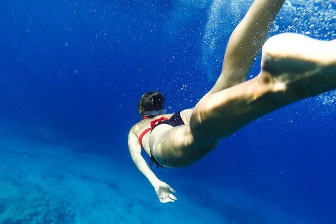 Santorini Private Motor Yacht Cruise - Amoudi Bay and the Return to Santorini Harbor